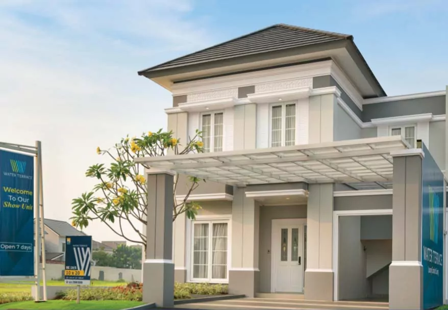 tampak depan rumah contoh unit rumah cluster water terrace type 145 di kawasan pemukiman moderen grandwisata